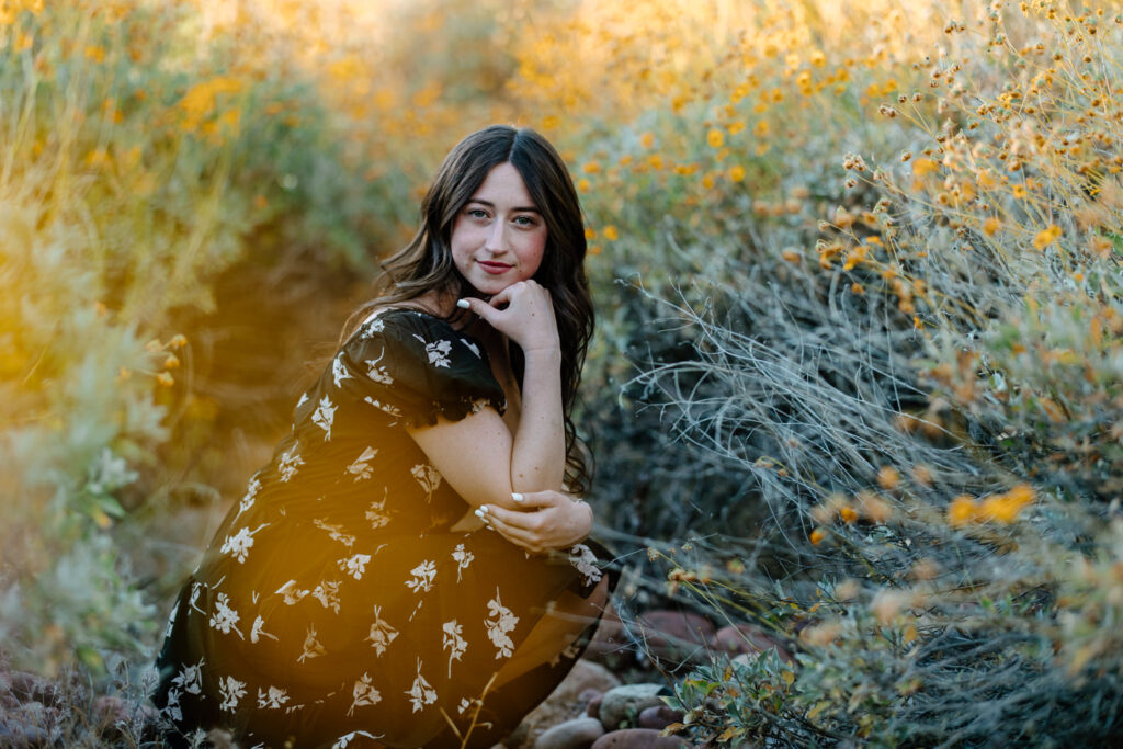 Senior photo session in the Beautiful yellow flowers at Water Users Recreation Site, Salt River, Mesa, Arizona.