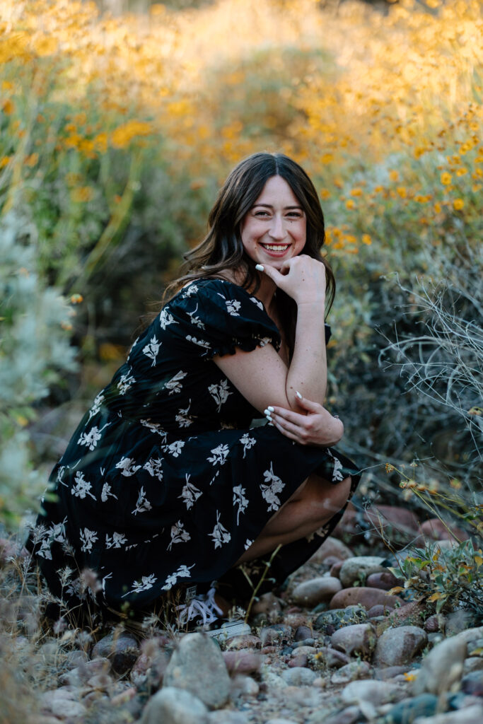 Senior photo session in the Beautiful yellow flowers at Water Users Recreation Site, Salt River, Mesa, Arizona.